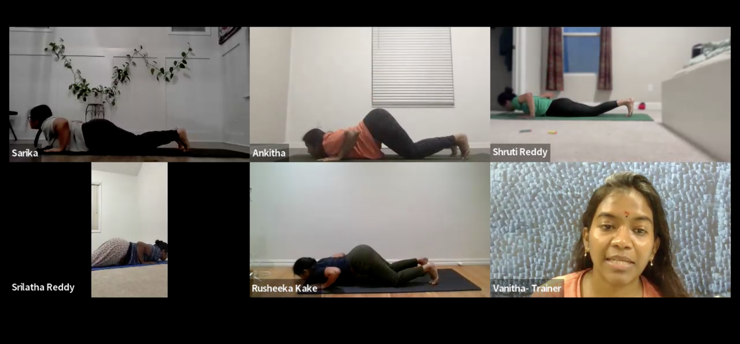 Women practicing yoga in a live online class